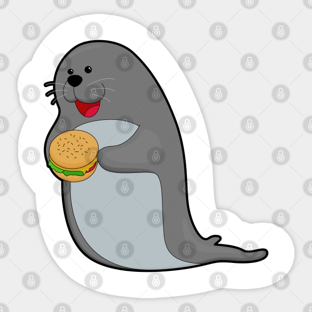 Seal at Eating with Burger Sticker by Markus Schnabel